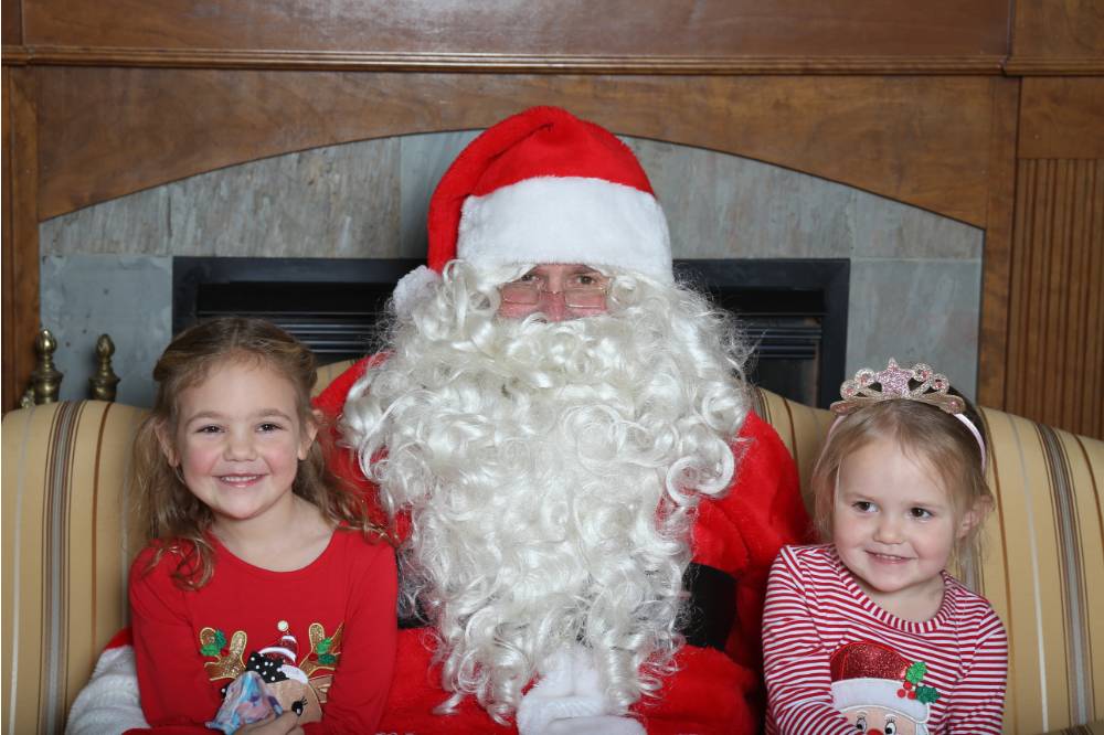 santa with two girls